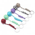 Keychain with personal defense ball