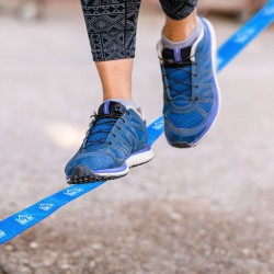 Slackline kit with ribbon and tree protector.