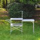 Portable and folding camping table - silver color.