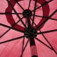 Parasol tipo guarda-chuva reclinável para terraço e jarro.