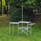 Portable and folding camping table - silver color.