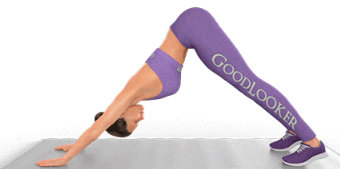 Rock climber in downward facing dog position, exercise