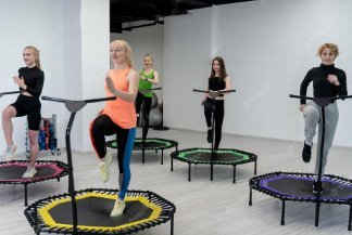 Girls practicing Jumping Fitness