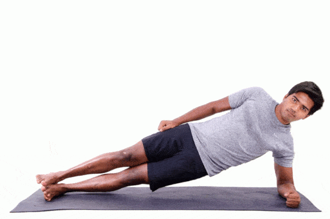 Plank laterale con elevazione delle gambe, esercizio di rinforzo dei muscoli lombari e addominali