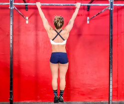 Hanging from a pull-up bar