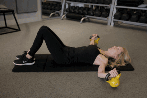 flat fly with kettlebell