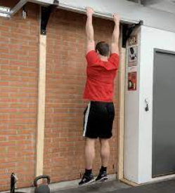 Hanging the body from the bar, postural exercises