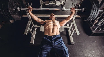 Holding the weight in bench press, isometric technique of bodybuilding