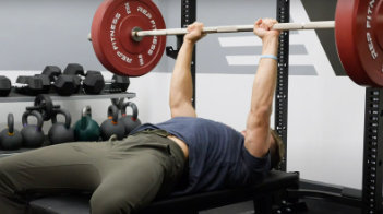 Close grip bench press to improve triceps