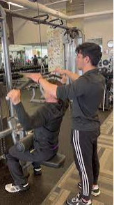 Spotter on back exercise