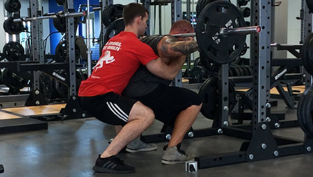 Barbell squat spotter