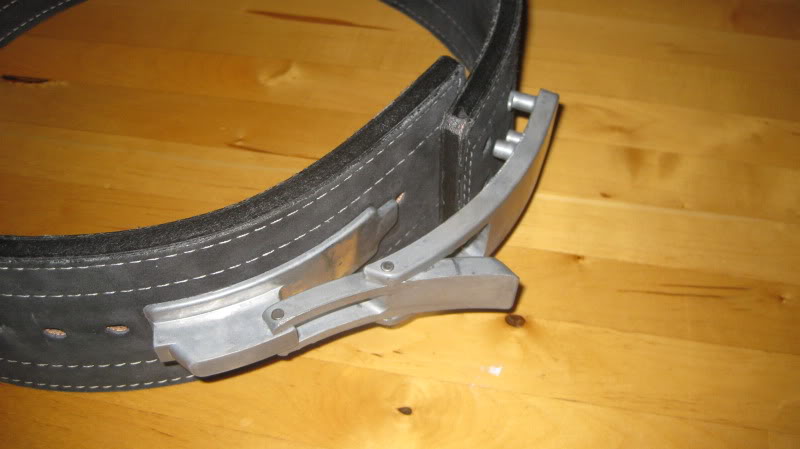 An inzer powerlifting belt with lever